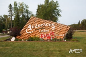 A wooden sign reads "Anderson's Lodge"